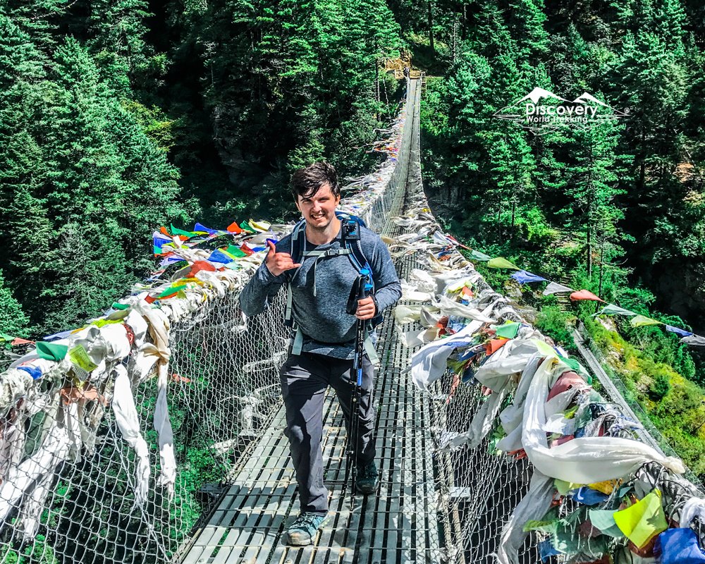 A guy in suspension bridge in his Everest base Camp trek