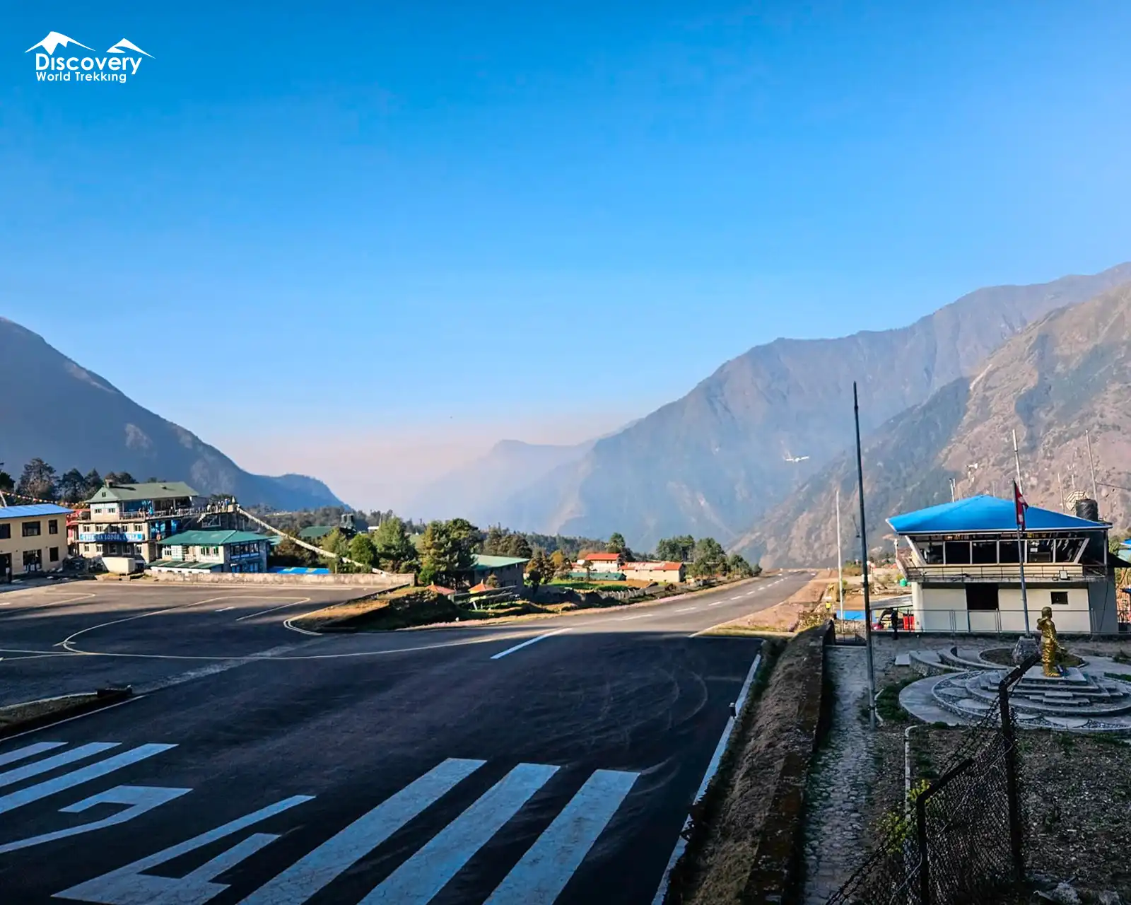 Adventurous start of the Everest Base Camp Trek with flight landing at Lukla Airport, the gateway to the stunning Everest region.
