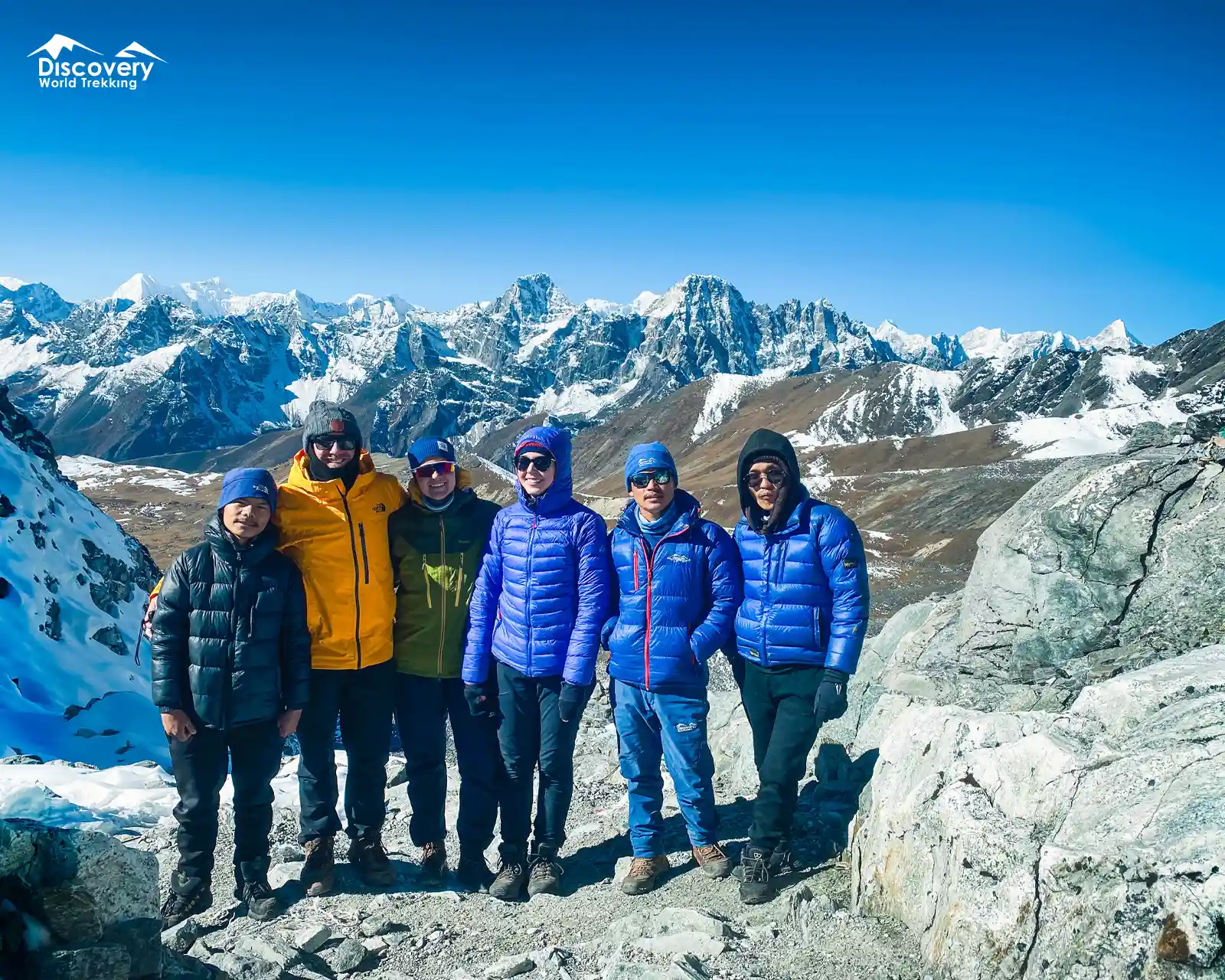 Chola Pass on the Everest Three Pass trek, surrounded by everest mountain range.